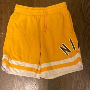Yellow Nike sweat shorts